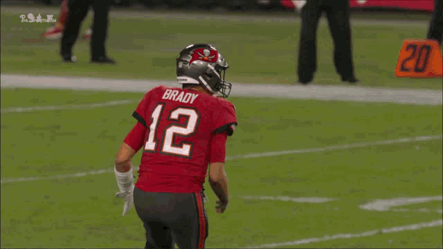 a football player wearing a helmet that says tampa bay on it