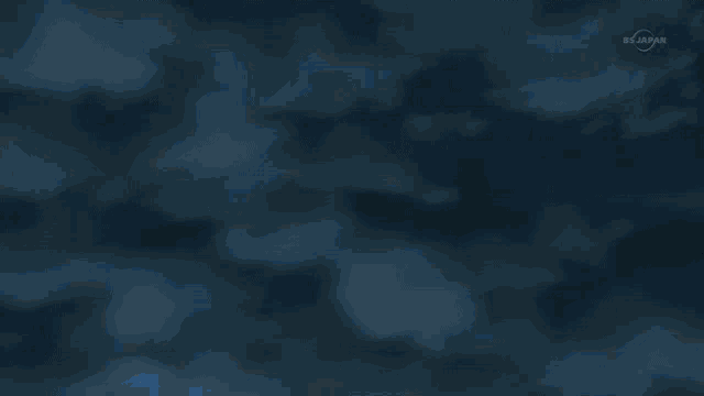 a blue sky with a lot of clouds and a few rays of light