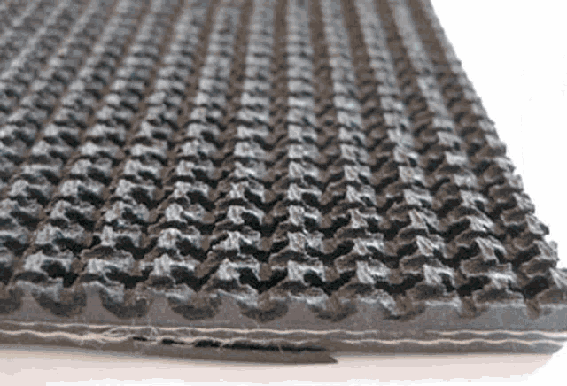 a close up of a rubber mat that looks like a tire track