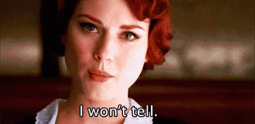 a close up of a woman 's face with the words `` i won 't tell '' written on it .