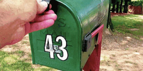 a mailbox with the number 43 on it