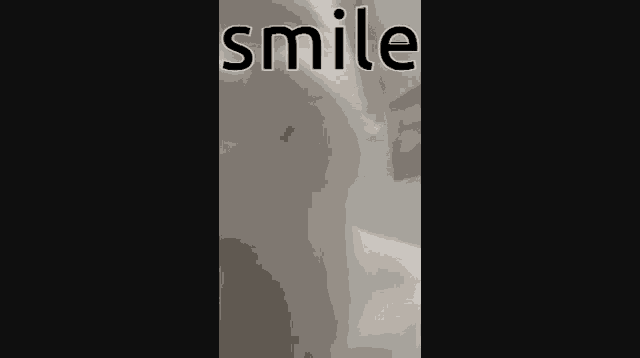 a close up of a person 's face with the word smile written above it .