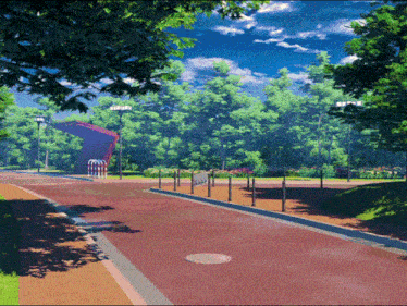 a red road with a manhole cover on the side of it