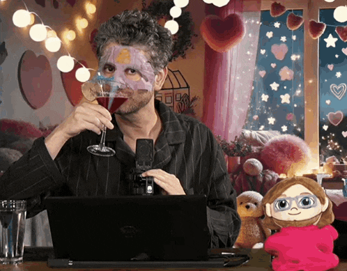 a man with a mask on his face drinking a glass of wine