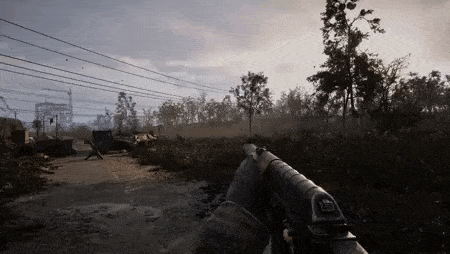 a person is holding a gun in a video game with trees in the background .