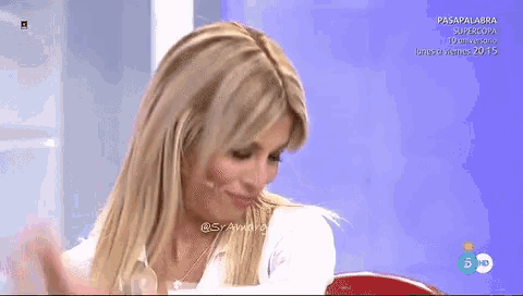 a woman on a television show with the number 5 on the bottom