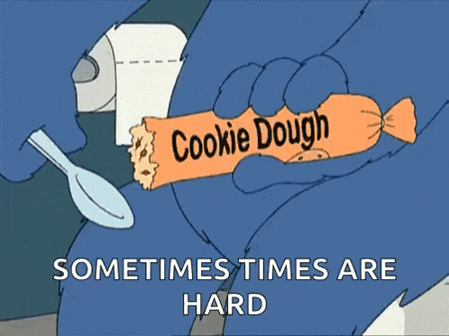 cookie monster is sitting on a toilet eating a cookie with a spoon and saying `` sometimes times are hard '' .