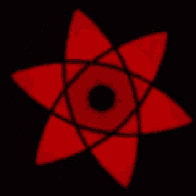 a red spiral with a black center is spinning on a black background