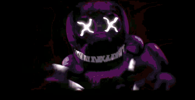 a purple monster with sharp teeth and glowing eyes is standing in a dark room .