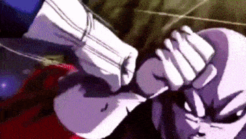 a close up of a person 's face with a fist .
