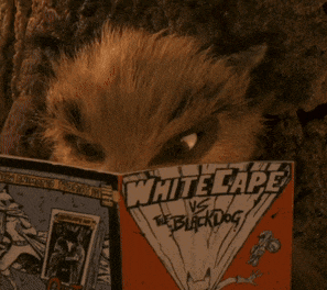 a dog is reading a comic book called whitecape vs. the black dog