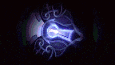 a purple and blue light is coming out of a hole in the dark