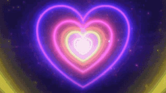 a neon heart is glowing in the dark on a dark background .
