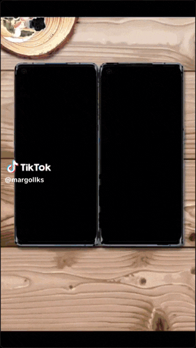 two cell phones on a wooden table with a tiktok logo