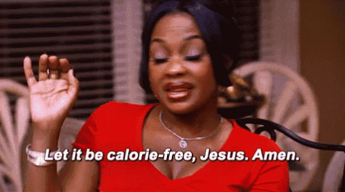a woman in a red shirt is saying " let it be calorie-free jesus amen "
