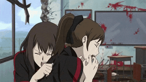 a couple of girls are sitting next to each other in a classroom with blood on the walls