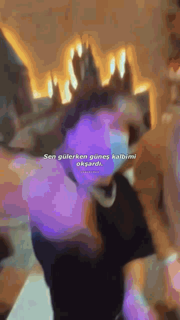 a purple background with the words sen guerken gunes kalbimi oksardi