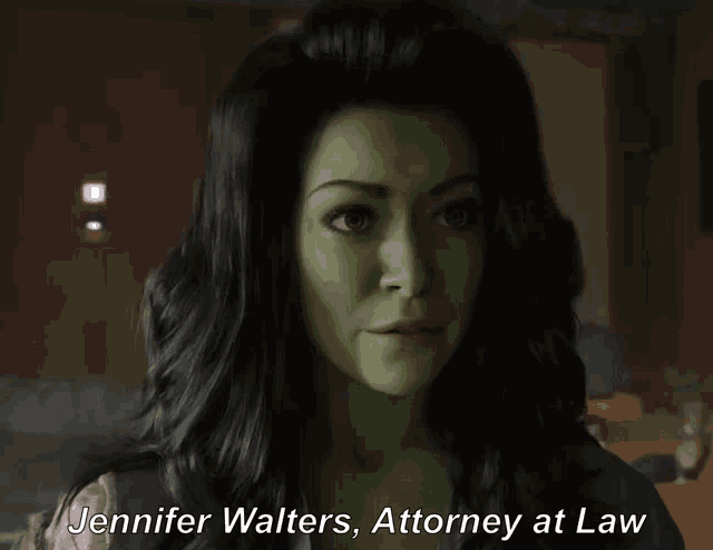 a woman with green hair is talking about jennifer walters