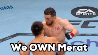 two men are fighting in a boxing match and the words we own merat are on the screen