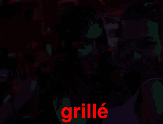 a man in a skeleton costume is standing in front of a machine that says grille on it