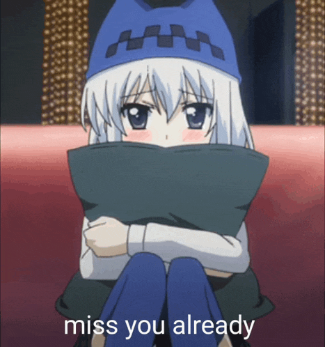a girl with white hair and a blue hat is hugging a pillow and says " miss you already "