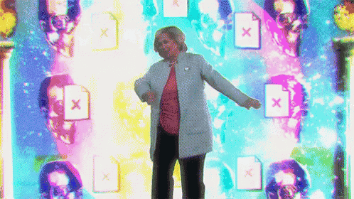 a woman is dancing in front of a wall with x 's on them