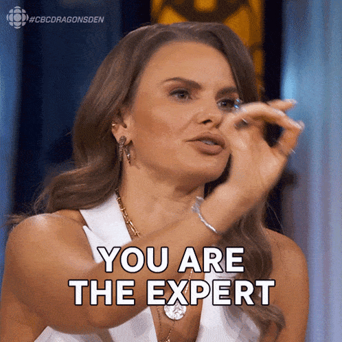 a woman says " you are the expert " while pointing her finger