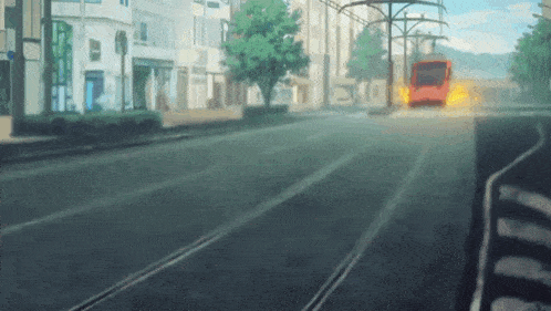 a train is going down the tracks in a city
