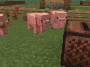 a group of pigs are standing next to each other in a field in a video game .