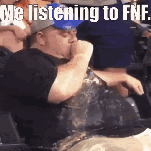 a man is sitting in a stadium with a bottle of water in his hand and a meme that says me listening to fnf
