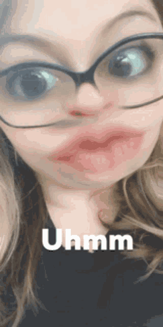 a woman wearing glasses is making a funny face with the word uhmm written below her