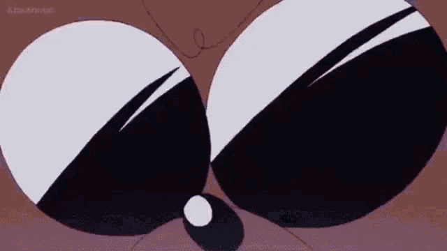 a close up of a cartoon character 's eyes with a black and white stripe on them .
