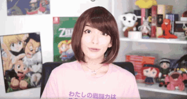 a woman wearing a pink t-shirt that says z on it