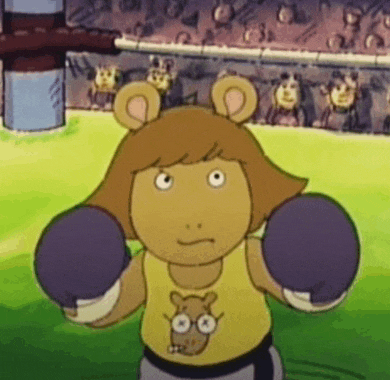a cartoon character wearing boxing gloves and a yellow shirt