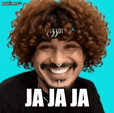 a man with curly hair and a beard is smiling with the words ja ja ja on his face .