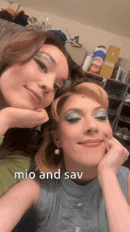 two women are posing for a picture with the words mio and sav on the bottom