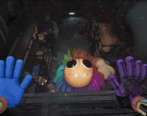 a purple glove with the number 100 on it is being held by a blue hand