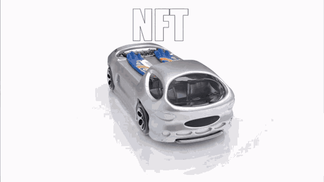 a silver car with the word nft written on it