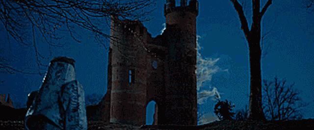 a castle tower with smoke coming out of it