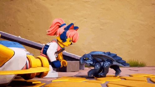 a girl with pink hair is standing next to a small blue toy dragon