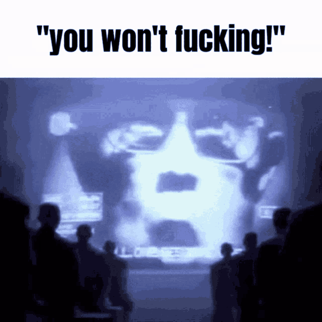 a group of people looking at a screen that says you won 't fucking