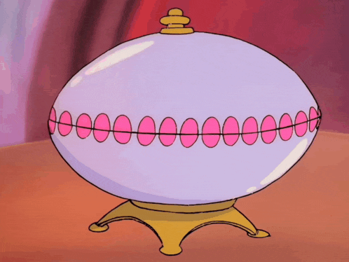 a cartoon drawing of a ball with a row of pink teeth on it