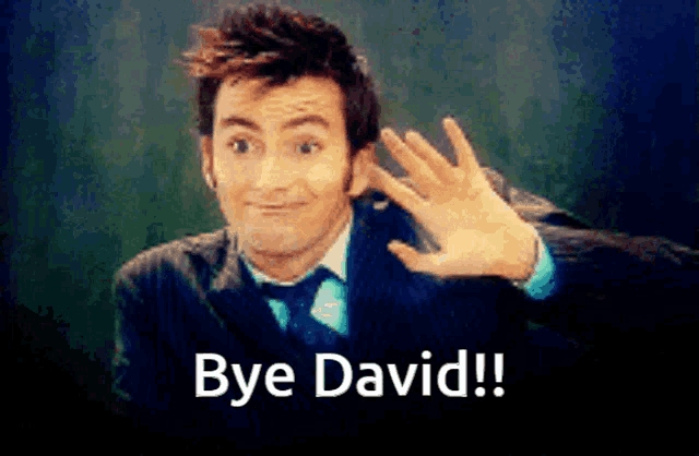 a man in a suit and tie is saying bye david with his hand