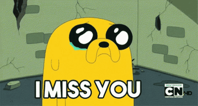 a cartoon character says i miss you in front of a wall
