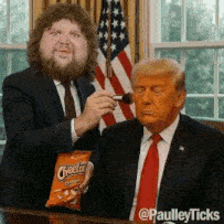 a man is applying makeup to donald trump while holding a bag of cheetos chips