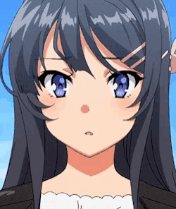 a close up of a girl 's face with a blue eye