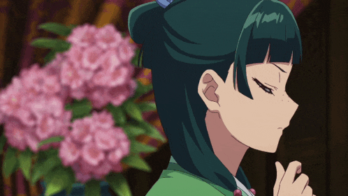 a girl with green hair stands in front of a pink flower
