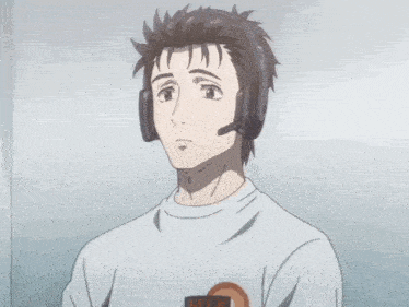a man wearing headphones is smiling with his mouth open