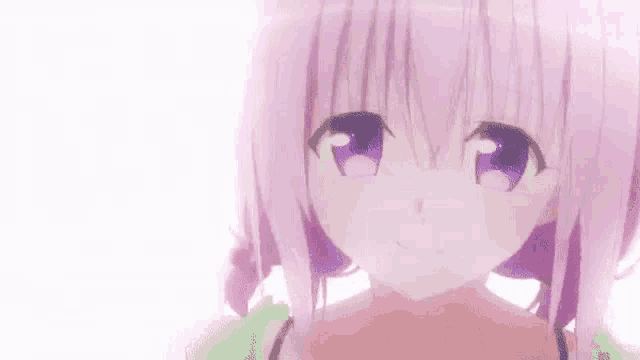 a close up of a girl with pink hair and purple eyes .