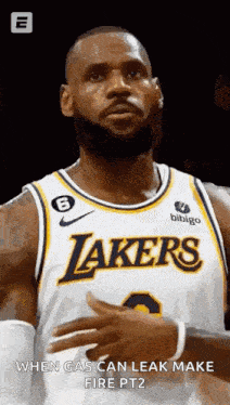 lebron james is wearing a lakers jersey while playing basketball .